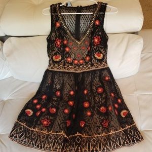 Bebe embroidered intricate dress